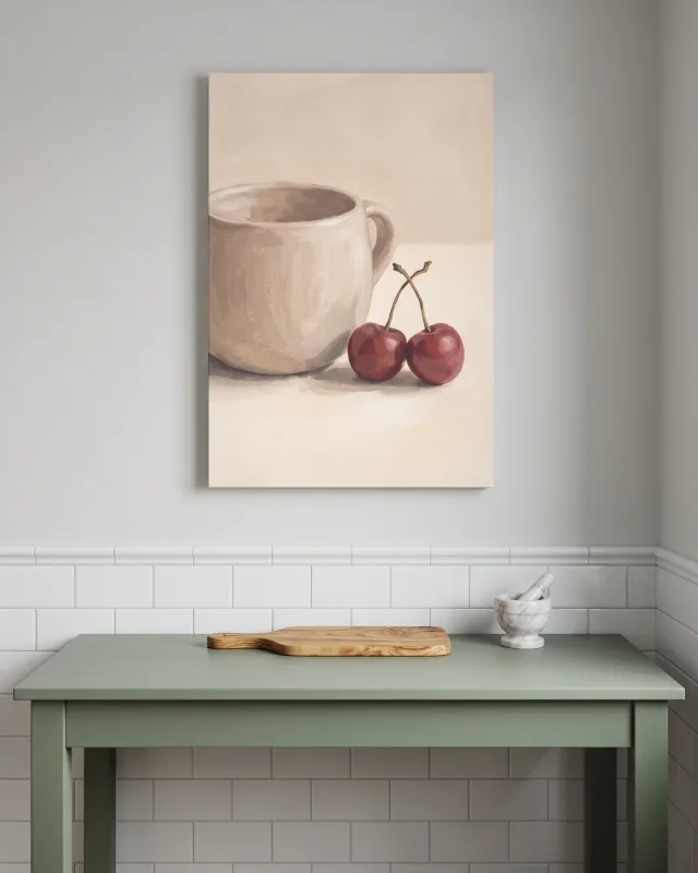 Canvas print – Pale Cup beside a Glossy Cherry Pair